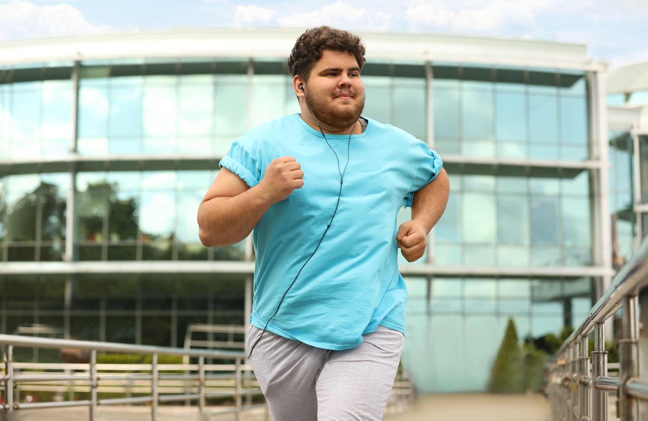 Behandlung von Übergewicht, Mann geht joggen